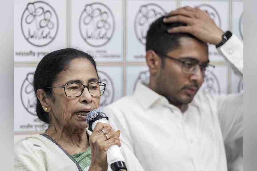 Outgoing West Bengal Chief Minister and TMC supremo Mamata Banerjee addresses a press conference, at her Kalighat residence in Kolkata, Tuesday, May 5, 2026. Party MP Abhishek Banerjee also seen.