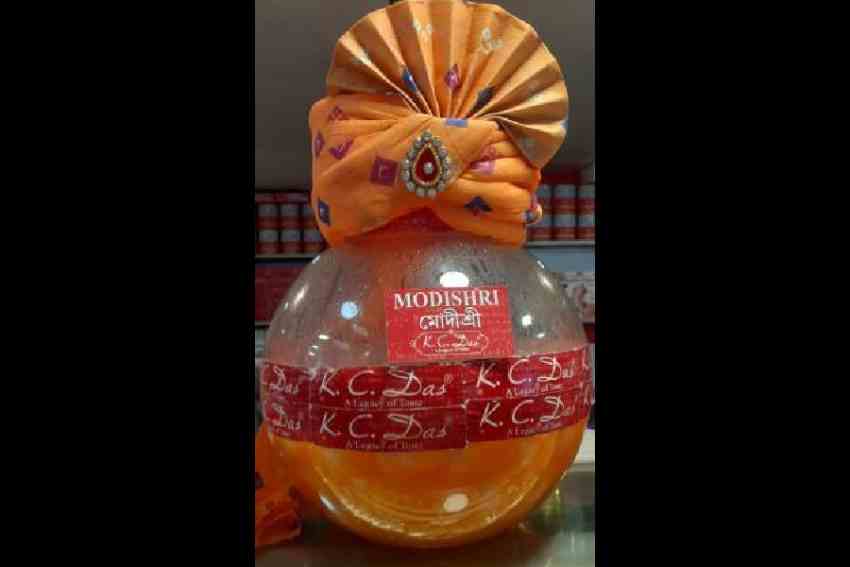 Saffron rosogollas at a store