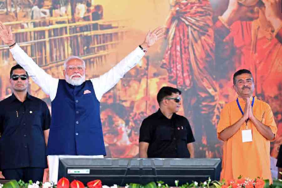 Prime Minister Narendra Modi with Suvendu Adhikari on the Brigade stage on Saturday. Pictures by Sanat Kr Sinha
