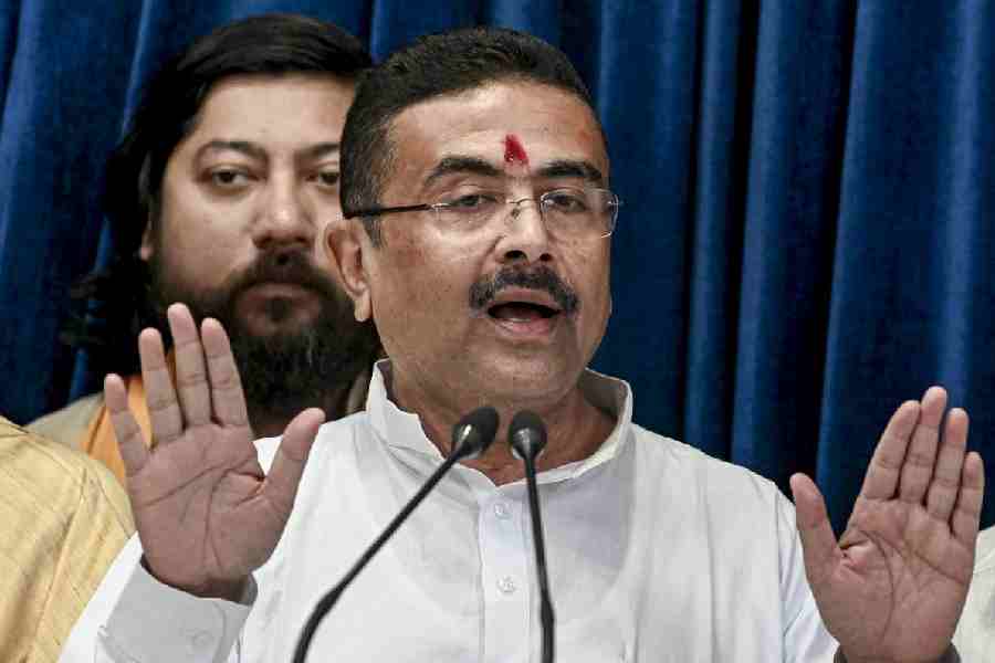Bengal Chief Minister Suvendu Adhikari addresses a press conference after the first cabinet meeting of the state government, in Howrah, Monday, May 11, 2026.