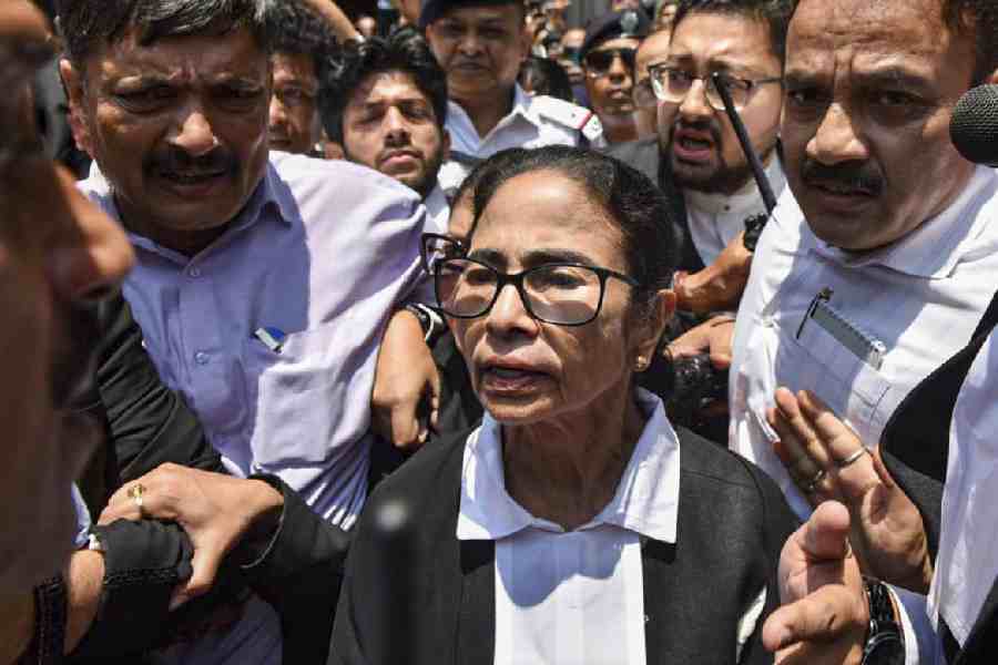 Trinamool supremo Mamata Banerjee leaves Calcutta High Court on Thursday.