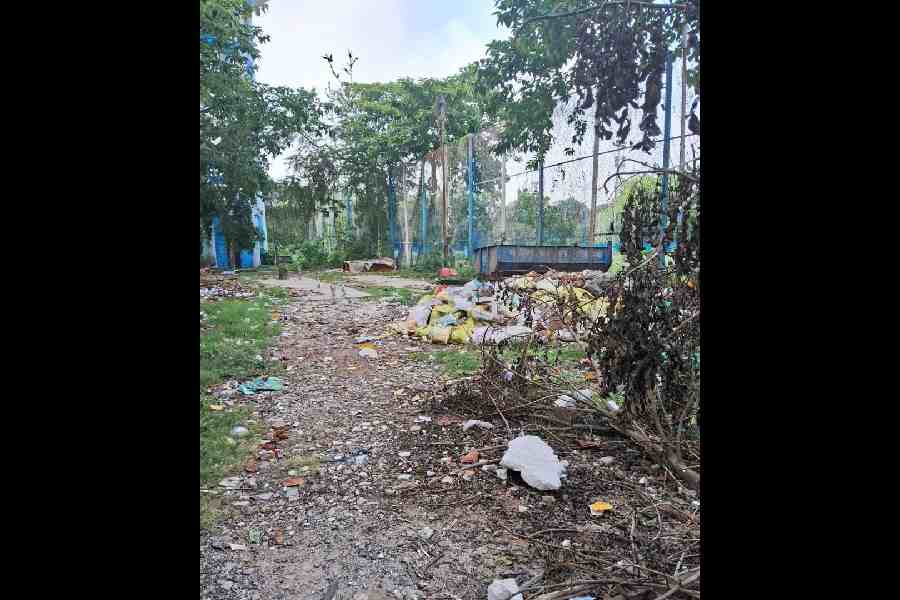 The compound behind the health centre which has also turned into another garbage dumpyard