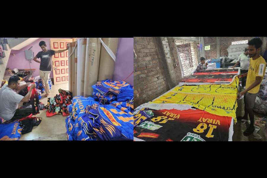MATCH MAKERS: Salesmen pack consignments for trains headed for Guwahati ahead of matches there.