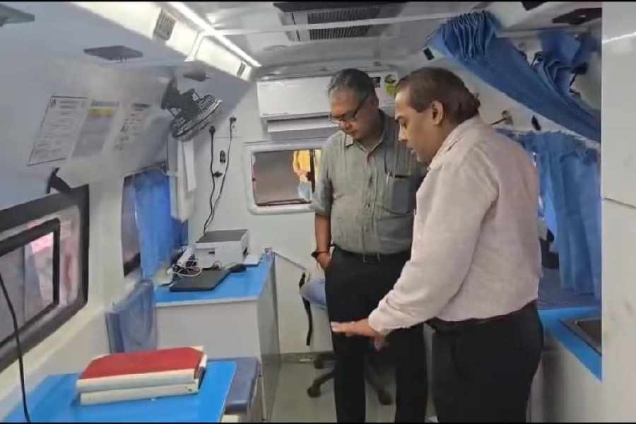 MLA Saradwat Mukherjee inside a mobile medical unit run by Bidhannagar Subdivisional Hospital with superintendant Partha Pratim Guha on Tuesday