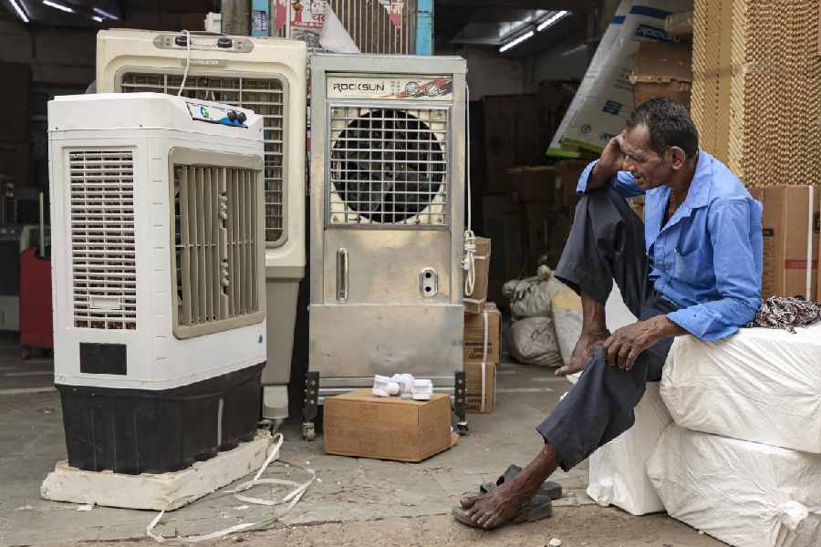 A man talks on a phone amid heatwave conditions