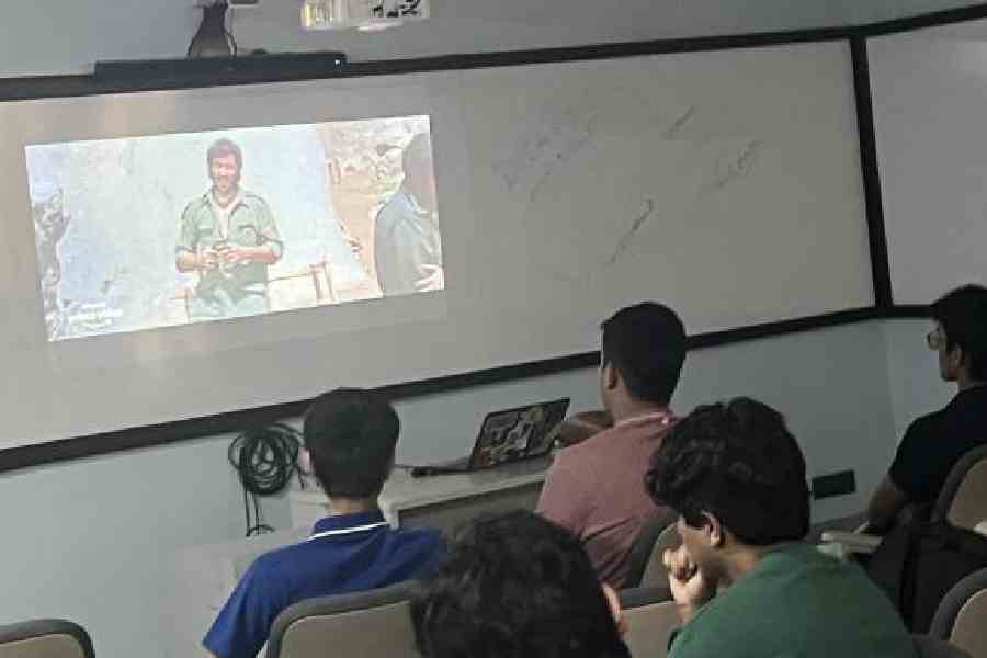 Students of Modern High School International watching Sholay to comprehend culture in cinema