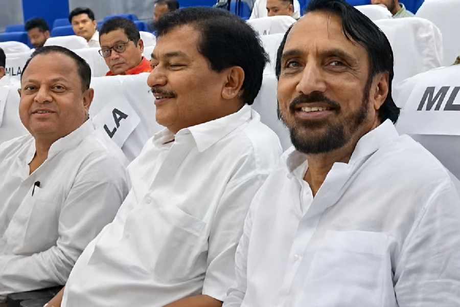 Trinamool MLAs (from right) Kanaialal Agarwala, Hamidul Rahaman and Md Ghulam Rabbani at the meeting in Uttarkanya