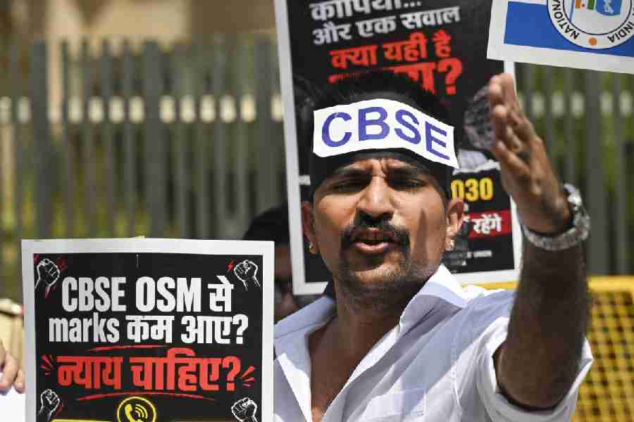 A member of National Students\' Union of India (NSUI) during a protest against CBSE