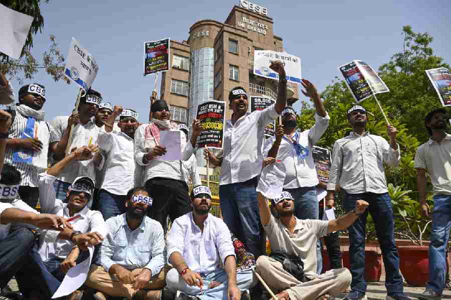National Students' Union of India (NSUI) members stage a protest