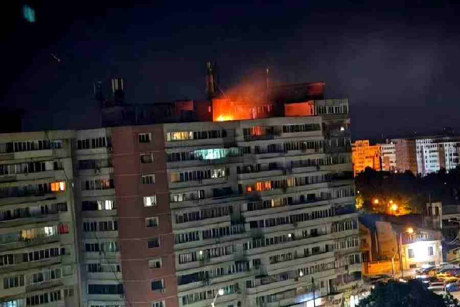 A fire burns on the roof of a 10-story block of flats after a drone crashed into the building, causing an explosion and injuring two people, near the border with Ukraine, in Galati, Romania, in this handout image released on May 29, 2026.