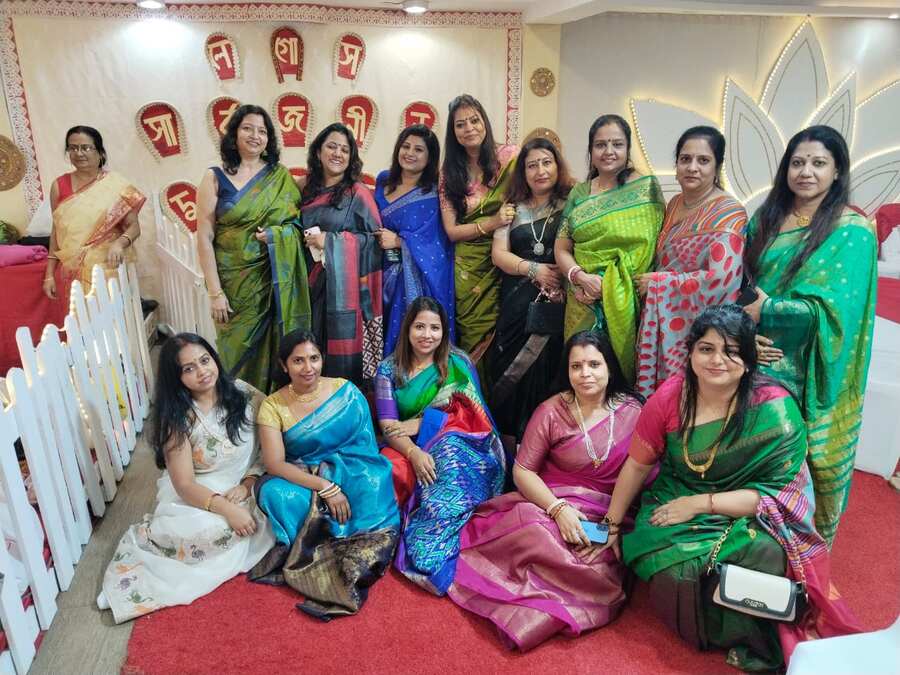 Traditional Bengali bhog remained an integral part of the festivities, bringing the familiar flavours of home to the celebrations. The women dressed in saris and men in kurta-pyjamas, reflecting the community's efforts to preserve the cultural practices associated with the festival.