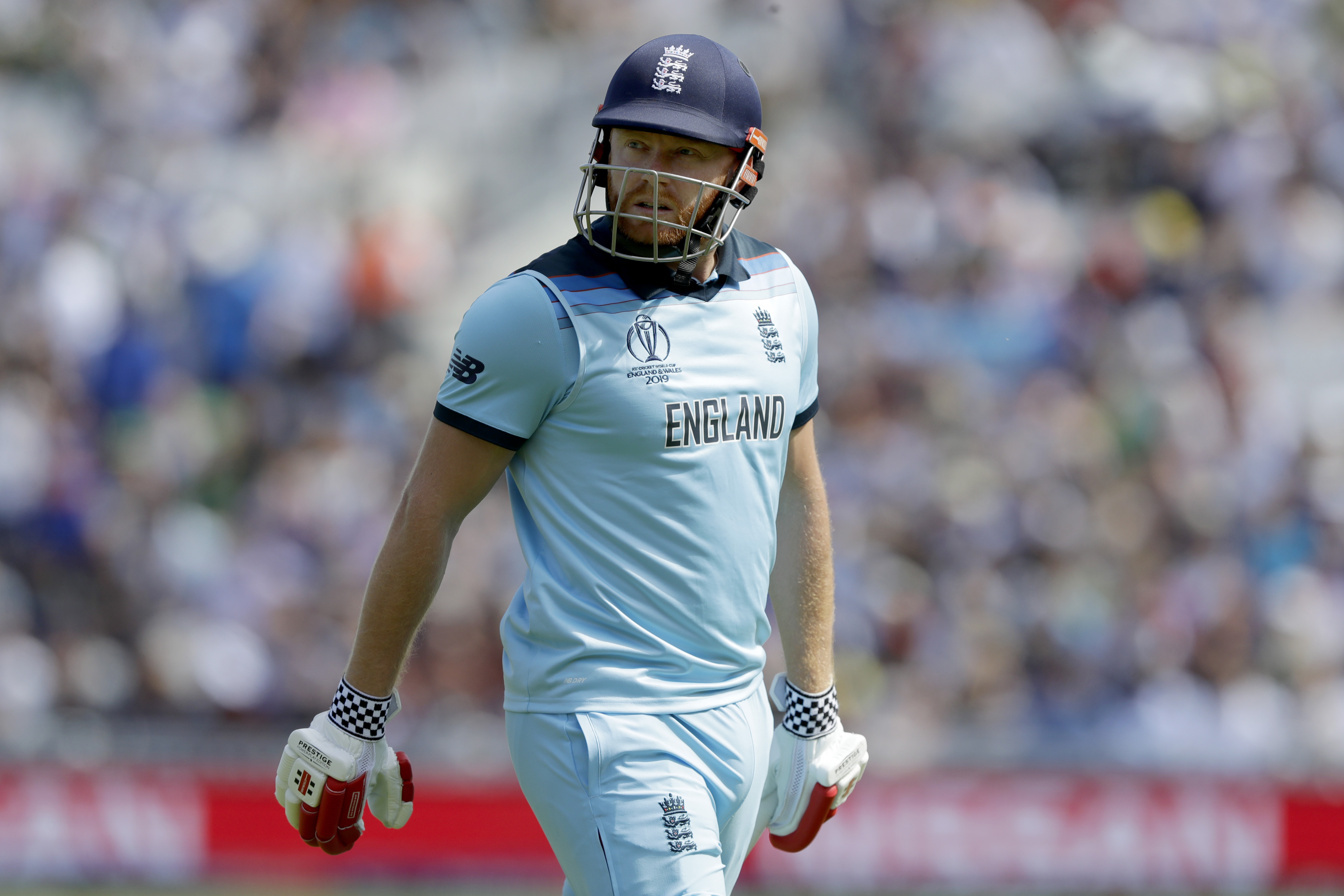 England's Jonny Bairstow leaves the pitch after he is caught by South Africa's Quinton de Kock off the bowling of South Africa's Imran Tahir during the first World Cup cricket match between England and South Africa at The Oval in London on Thursday.