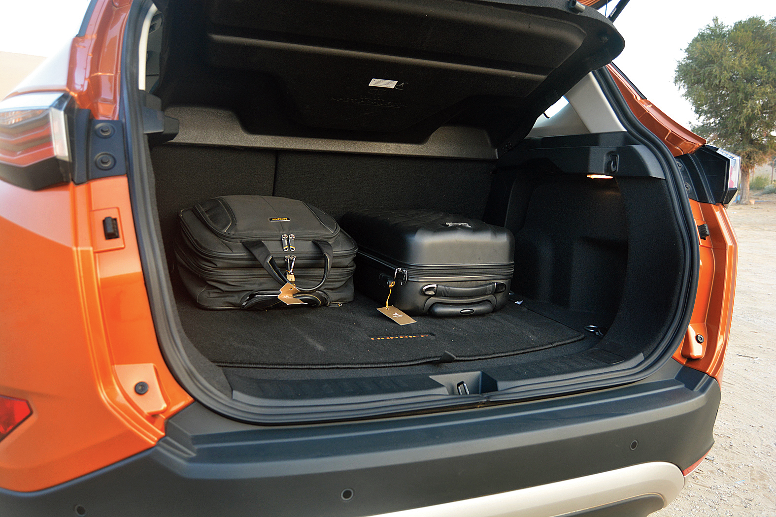The boot is easy to load and has a flat floor. There’s a pair of compartments under the floor as well