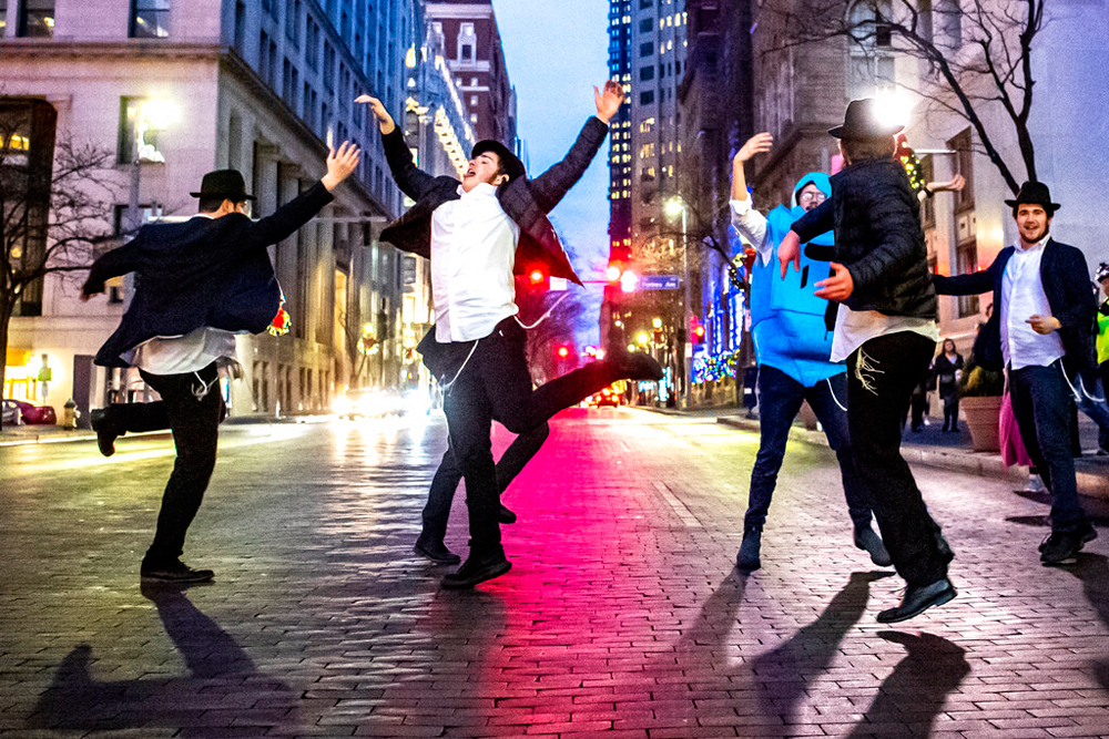 Students dance on December 26 in downtown Pittsburgh
