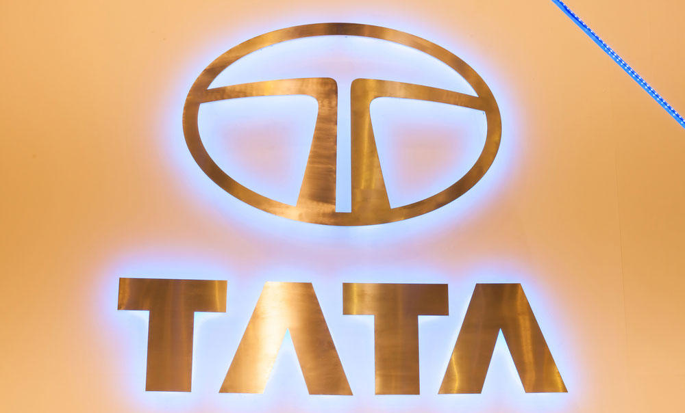 In this photo illustration, the Tata Steel logo is displayed on a