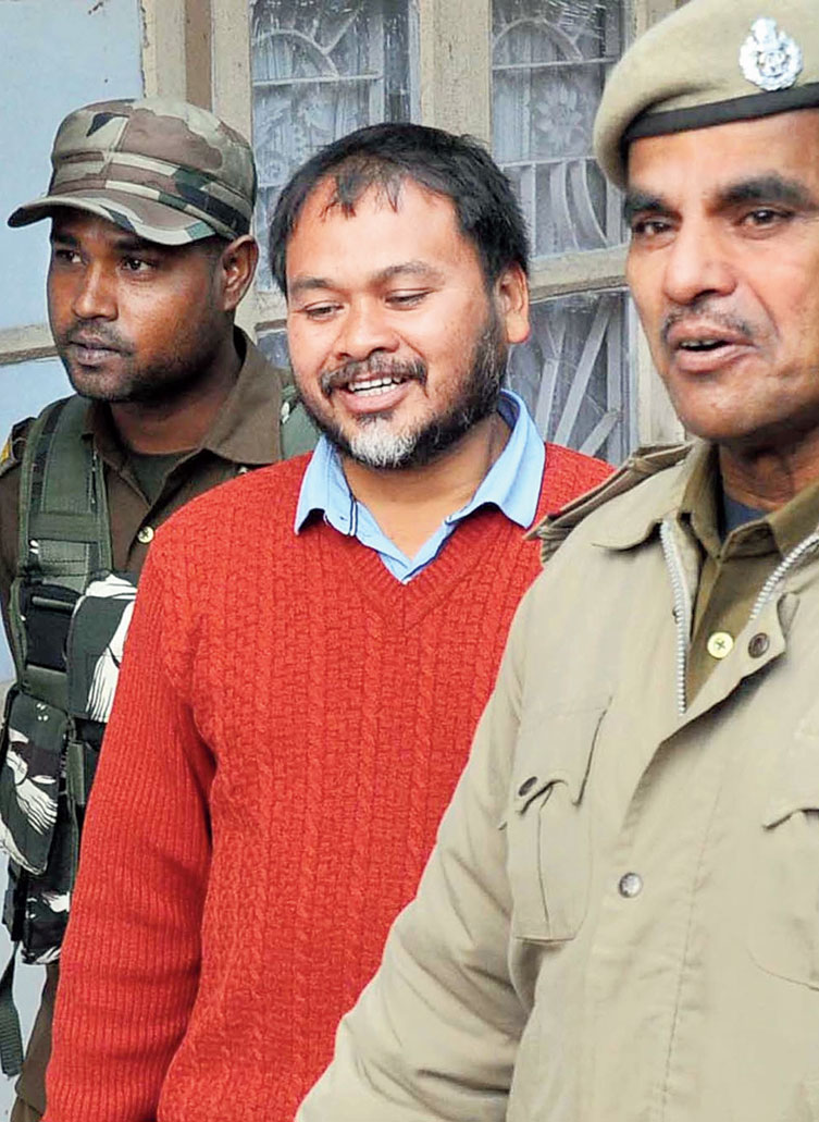 Akhil Gogoi being produced in court in Guwahati on Friday
