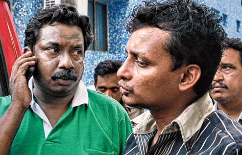 Minister Block Cuffs On Duo Telegraph India