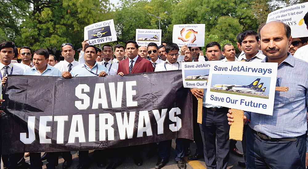 Employees of Jet Airways stage a demonstration at Jantar Mantar in New Delhi on Thursday. 