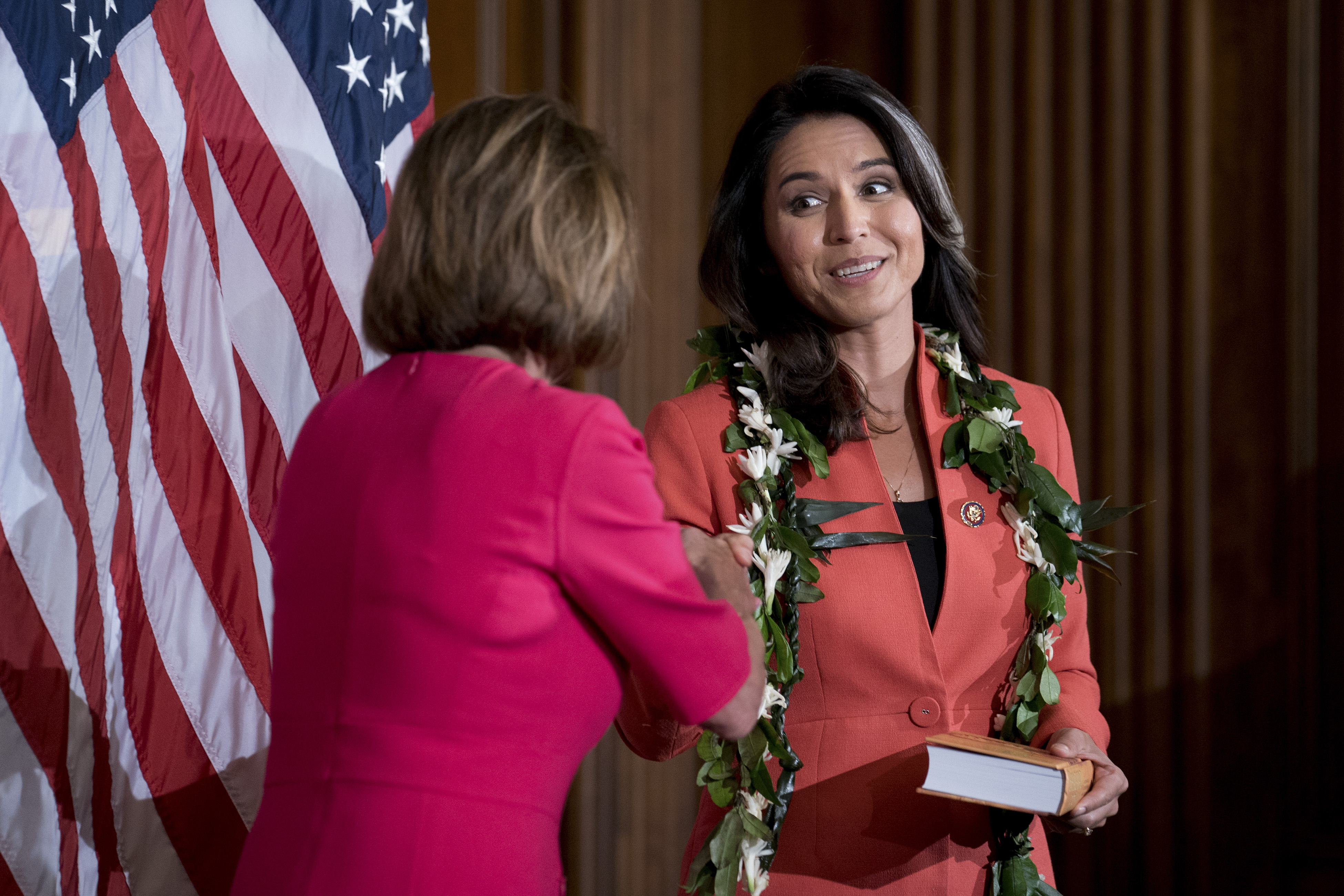 Tulsi Gabbard (right) is sworn in to the 116th Congress with House Speaker Nancy Pelosi on Capitol Hill in Washington on January 3, 2019.