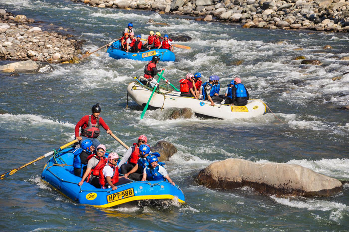 Tourists raft at the Beas River near Manali on Wednesday