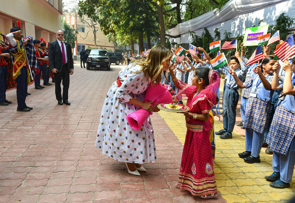 US First Lady Melania Trump being welcomed during her visit to a government school to witness various activities as part of the happiness curriculum, in New Delhi, Tuesday