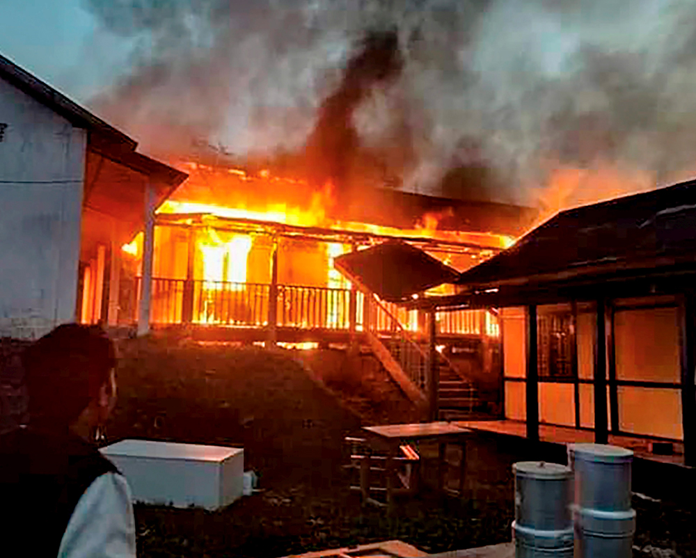 A building set on fire in Arunachal Pradesh's capital Itanagar after a mob went on a rampage during a protest against the move to grant permanent resident certificates to six communities living in the state, on Sunday.