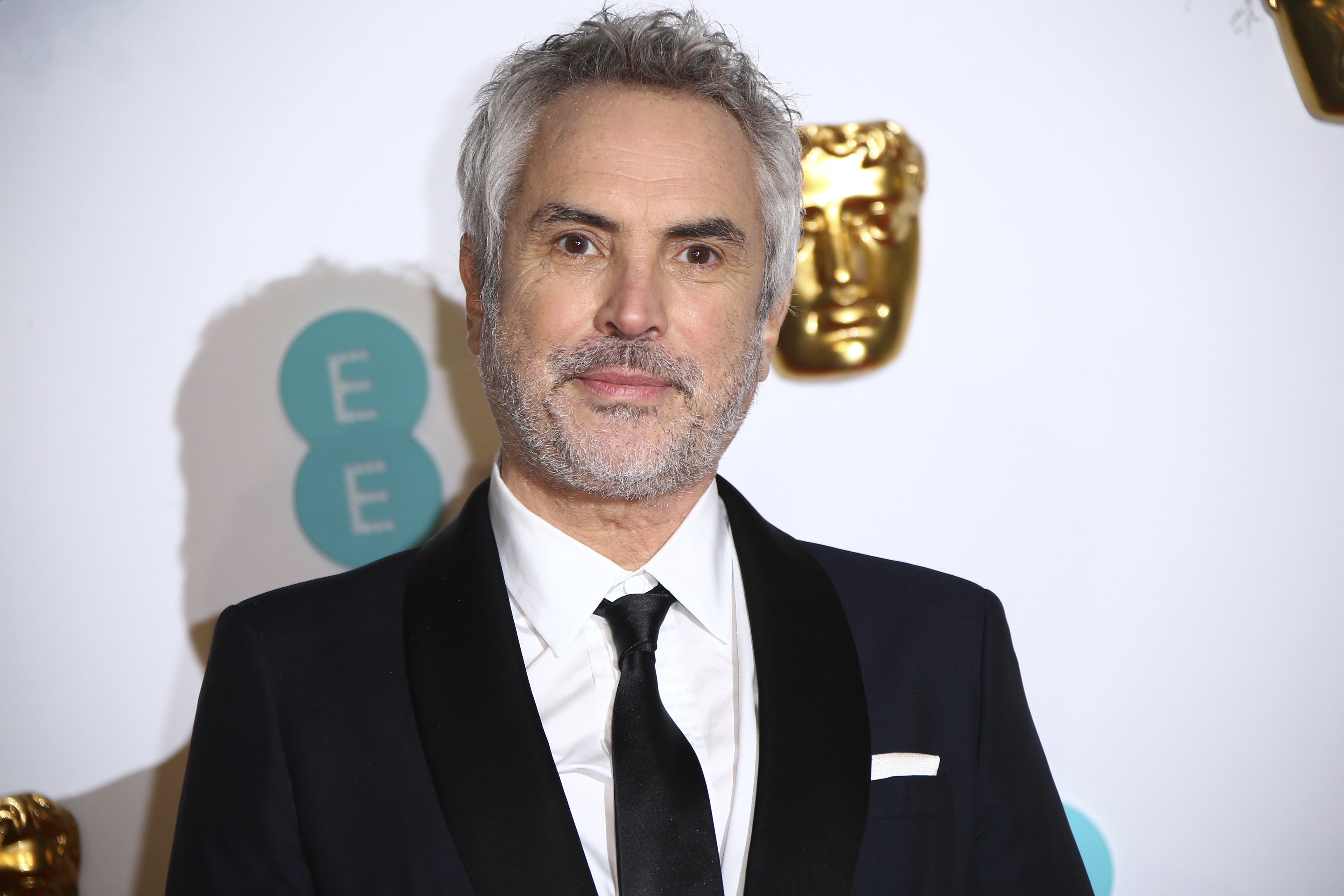 Director Alfonso Cuaron at the Baftas in London. He thanked Roma's backer, Netflix, for having the courage to support 