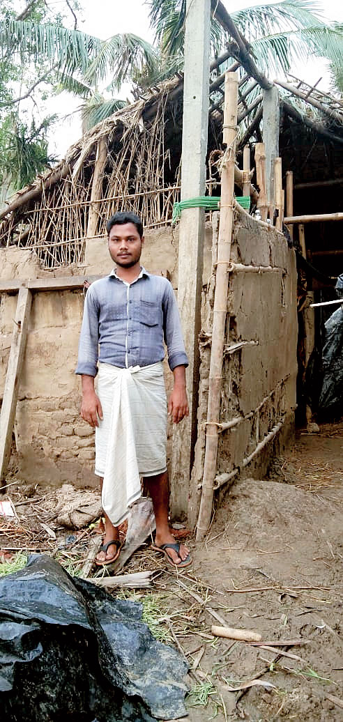 Atabur Rahman of East Midnapore before his ravaged mud hut in Nich Kasba.