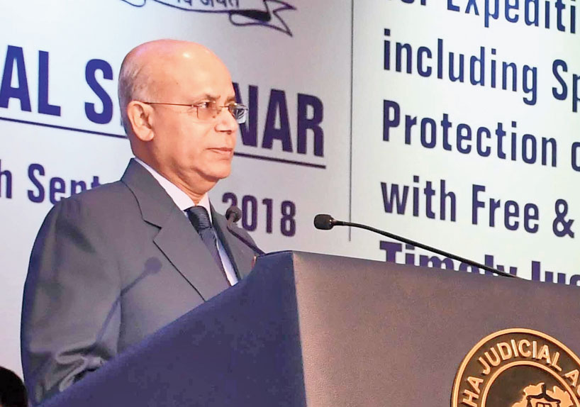 Supreme Court Judge Navin Sinha speaks at the national seminar organised by the Odisha Judicial Academy in Cuttack.