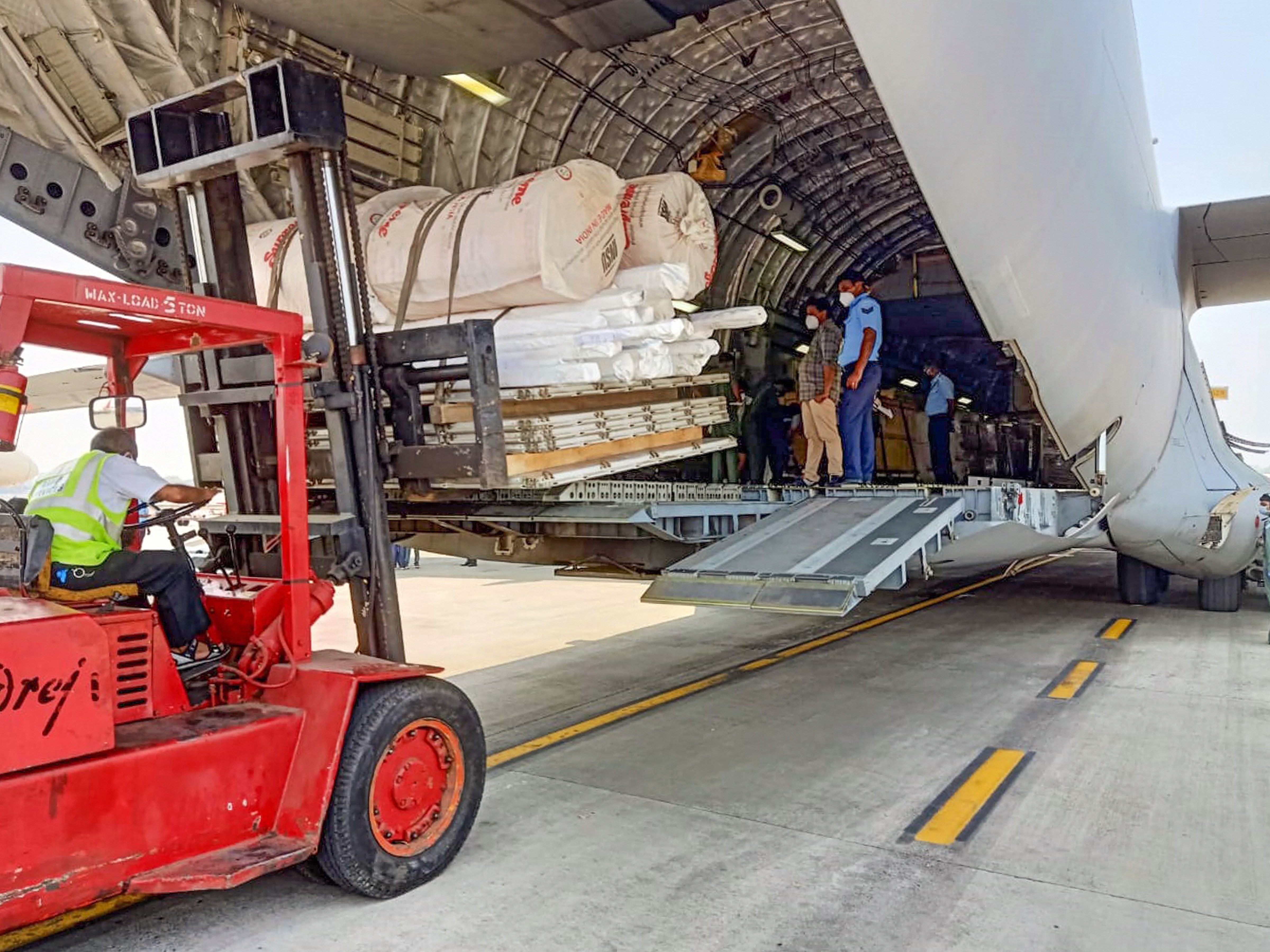 An IAF C-17 Globemaster-III aircraft being loaded with essential medical supplies and commodities to be airlifted to various parts of the country as part of IAF’s assistance to the civil administration to fight against the spread of COVID-19, in New Delhi, Monday, April 20, 2020.