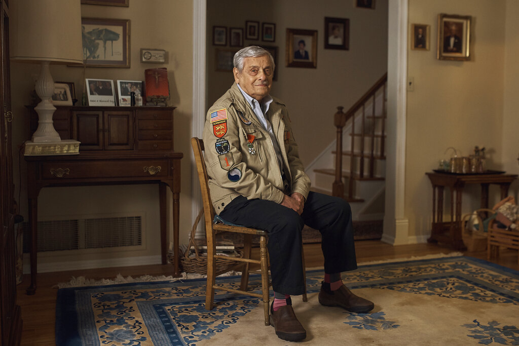 World War II US veteran Frank DeVita, who took part in the D-Day battle poses for a picture at his home in Bridgewater, New Jersey, May 14. This June he’ll make his 12th trip back to Normandy. He likes to bring people with him so they’ll know what happened there.