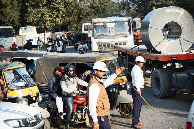 Traffic cops near Mango roundabout in Jamshedpur on Sunday. 