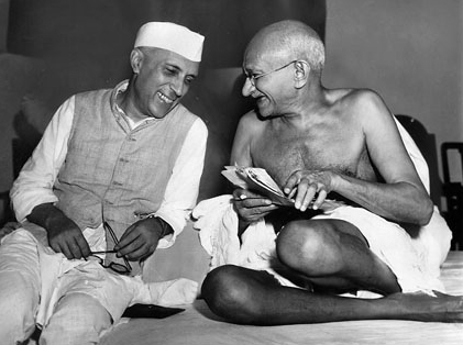 Jawaharlal Nehru sharing a joke with Mahatma Gandhi, during a meeting of the All India Congress, Mumbai, July 6, 1946