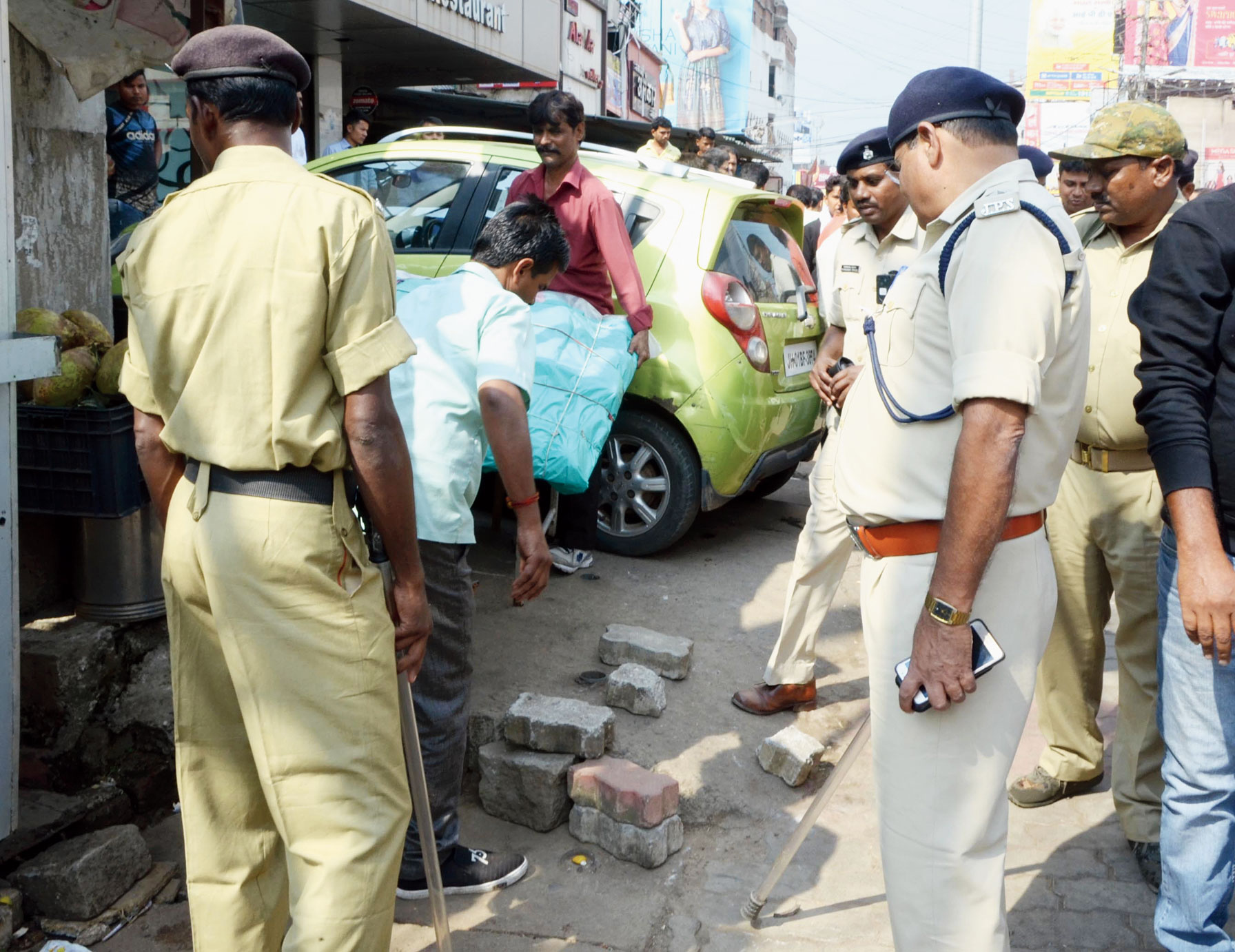 RMC enforcement team along with police during an anti-encroachment drive at Daily Market on Main Road in Ranchi on Saturday. 