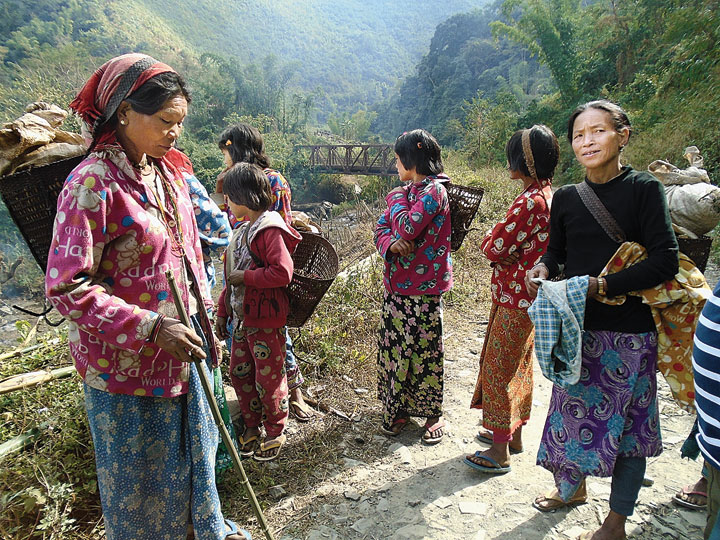 Women from Lazu in Arunachal Pradesh’s Tirap district cross the border into Assam to buy essential commodities
