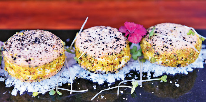 Savoury macaroons with orange zest and feta cheese base. This egg-less dish is best paired with wines and can be found in different varieties.
