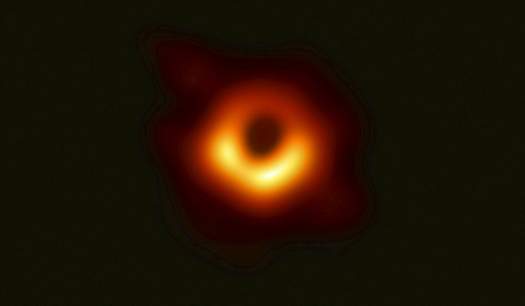 This false-color image released on April 10, 2019, by the Event Horizon Telescope, shows a black hole at the centre of the Messier 87 galaxy, located about 53 million light years away