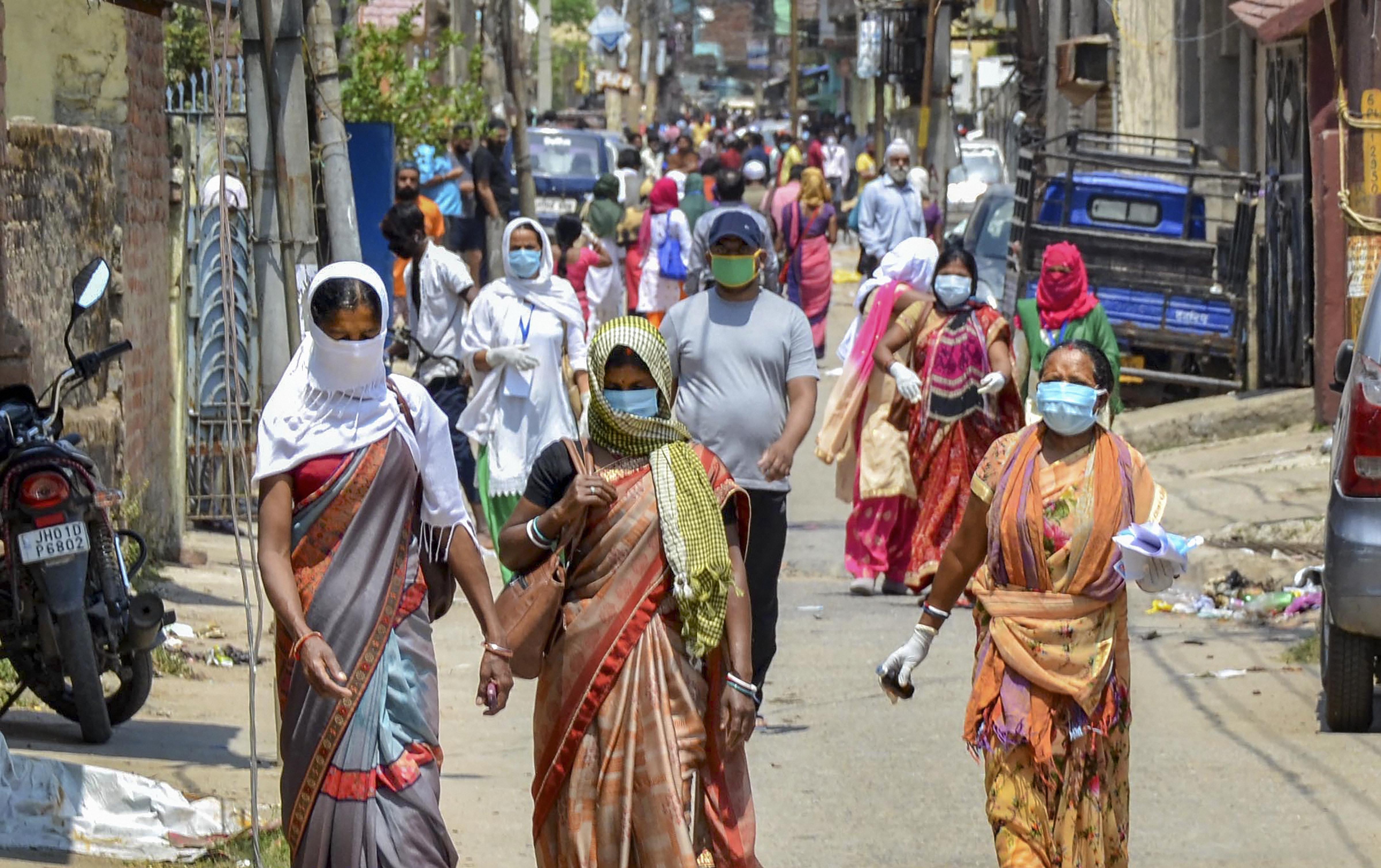  Health workers return back after they were denied permission by residents to collect samples for COVID 19 test, in Hindipiri area of Ranchi, Thursday, April 2, 2020. 