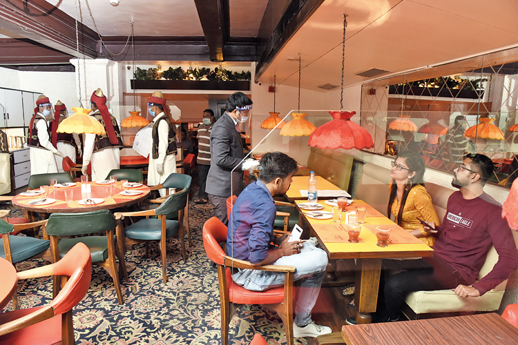 By 3.15pm, Peter Cat on Park Street had served “10 groups”. At 8pm, three tables were occupied and there was a bit of a rush because by 9pm the shutters had to be downed. “More than what we had expected on Day One,” said the manager, Hansel Bergeon. The restaurant could seat 160 diners at a time earlier. The number is 80 now.