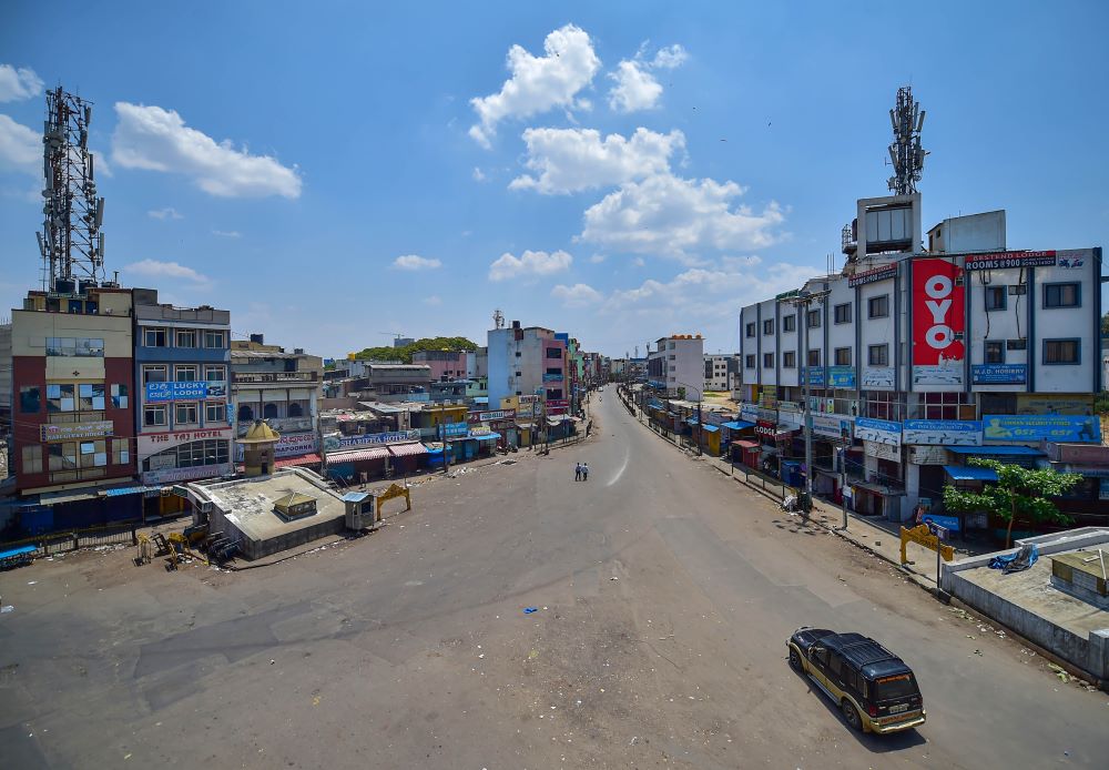 A city street wears a deserted look during Janata curfew in the wake of coronavirus pandemic, in Bengaluru, Sunday, March 22, 2020.