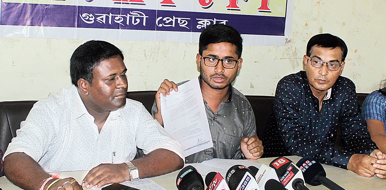 Mirajul Rasid (centre) addresses the news conference in Guwahati on Sunday. 
