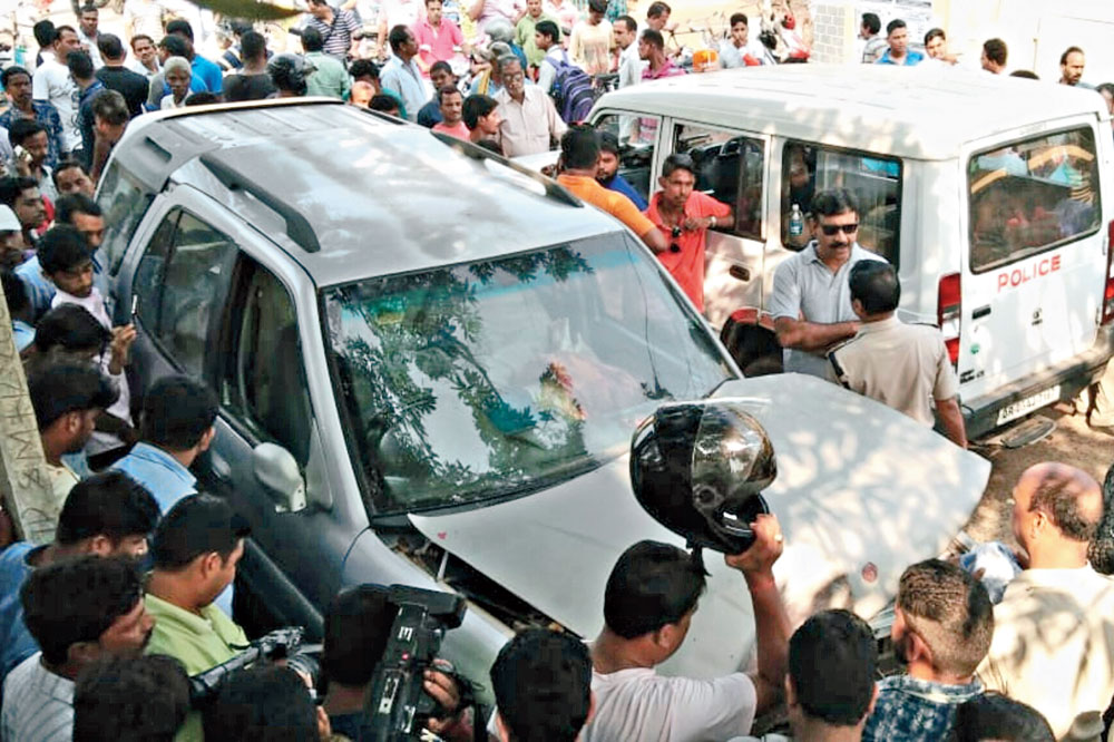 The body in the SUV at Samantarapur in Bhubaneswar on Monday
