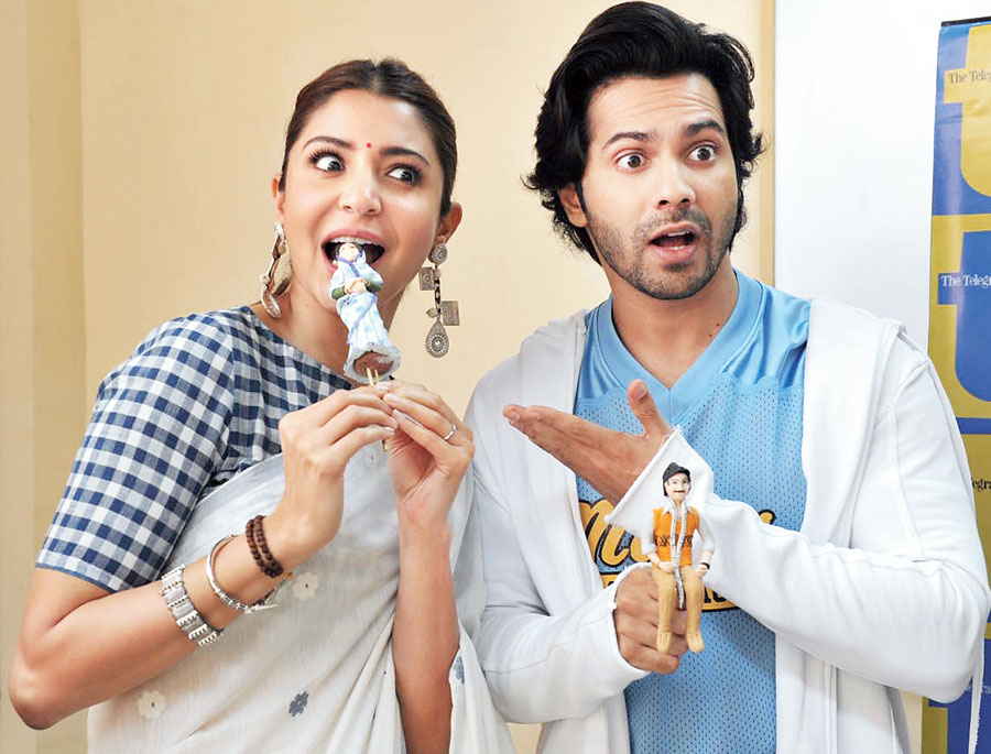 Nom Nom: “What’s she doing?!” mock-screamed Varun as Anushka took a bite of ‘Mamta’!