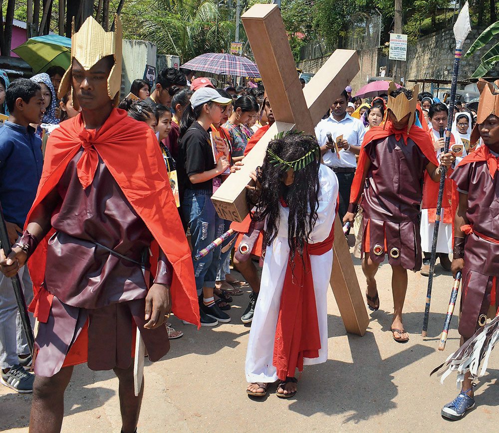 Devotees enact the crucifixion of Jesus Christ on Good Friday in Guwahati