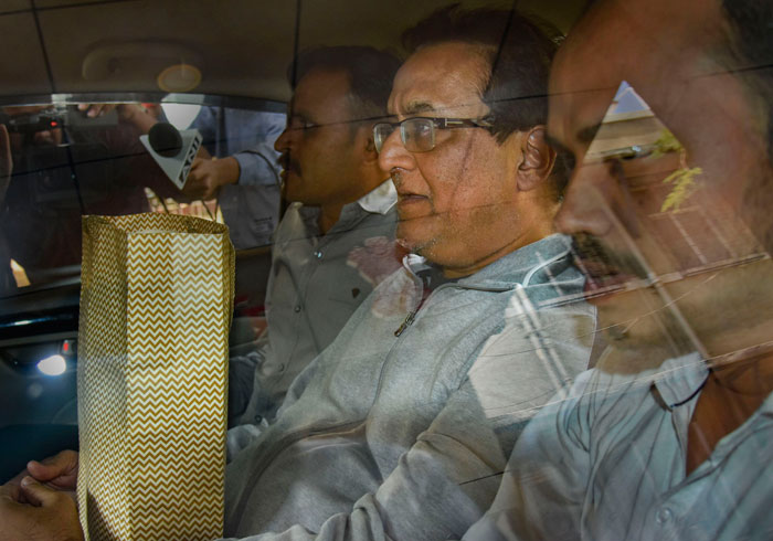 Yes Bank founder Rana Kapoor being taken to a court after being arrested by Enforcement Directorate under money laundering charges, in Mumbai, Sunday, March 8, 2020. 