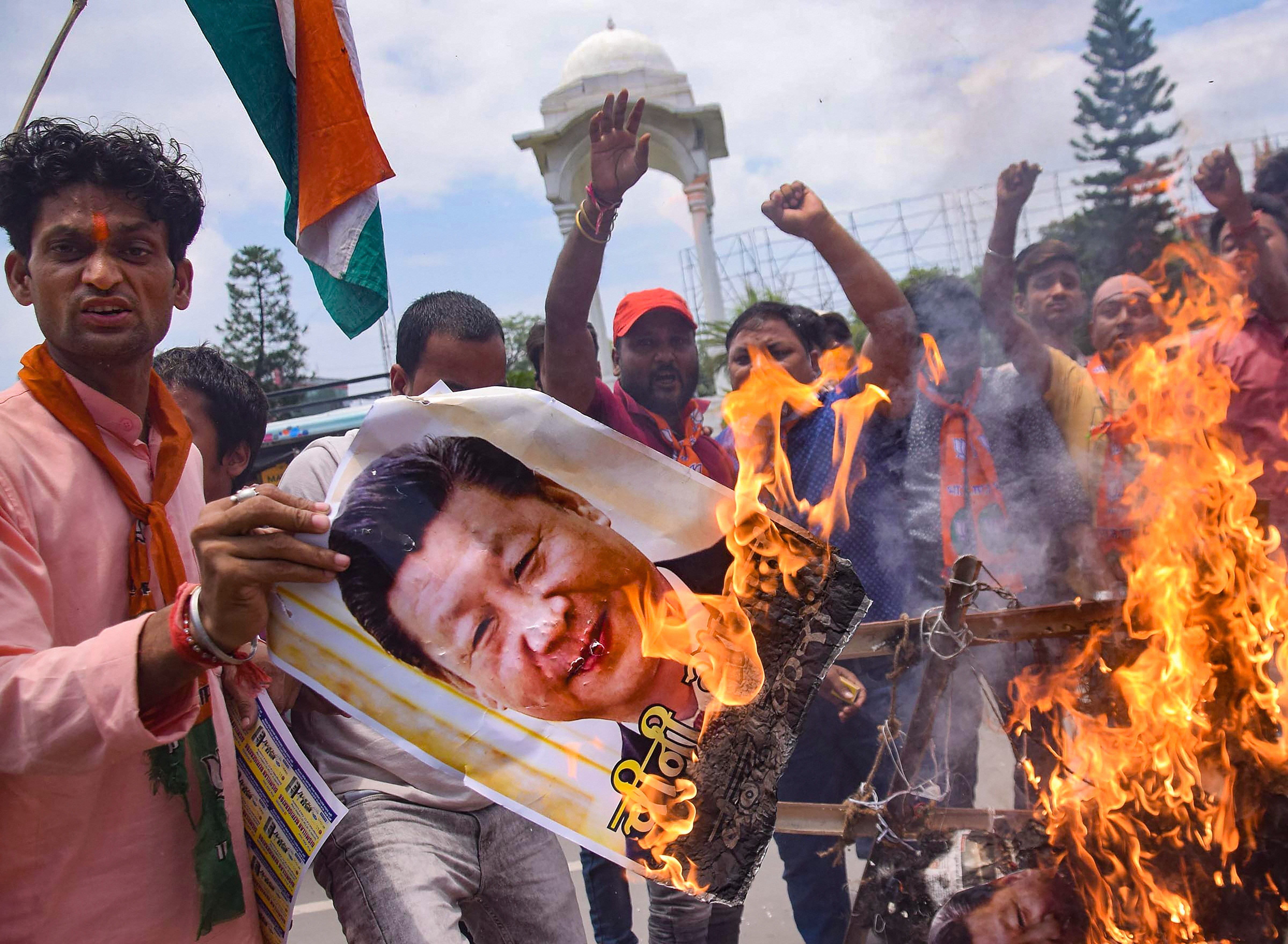 BJP activists burn an effigy of Chinese President Xi Jinping during a protest against the killing of 20 Indian Army soldiers in Ladakhs Galwan Valley by the Chinese troops, in Patna, Sunday, June 21, 2020. 