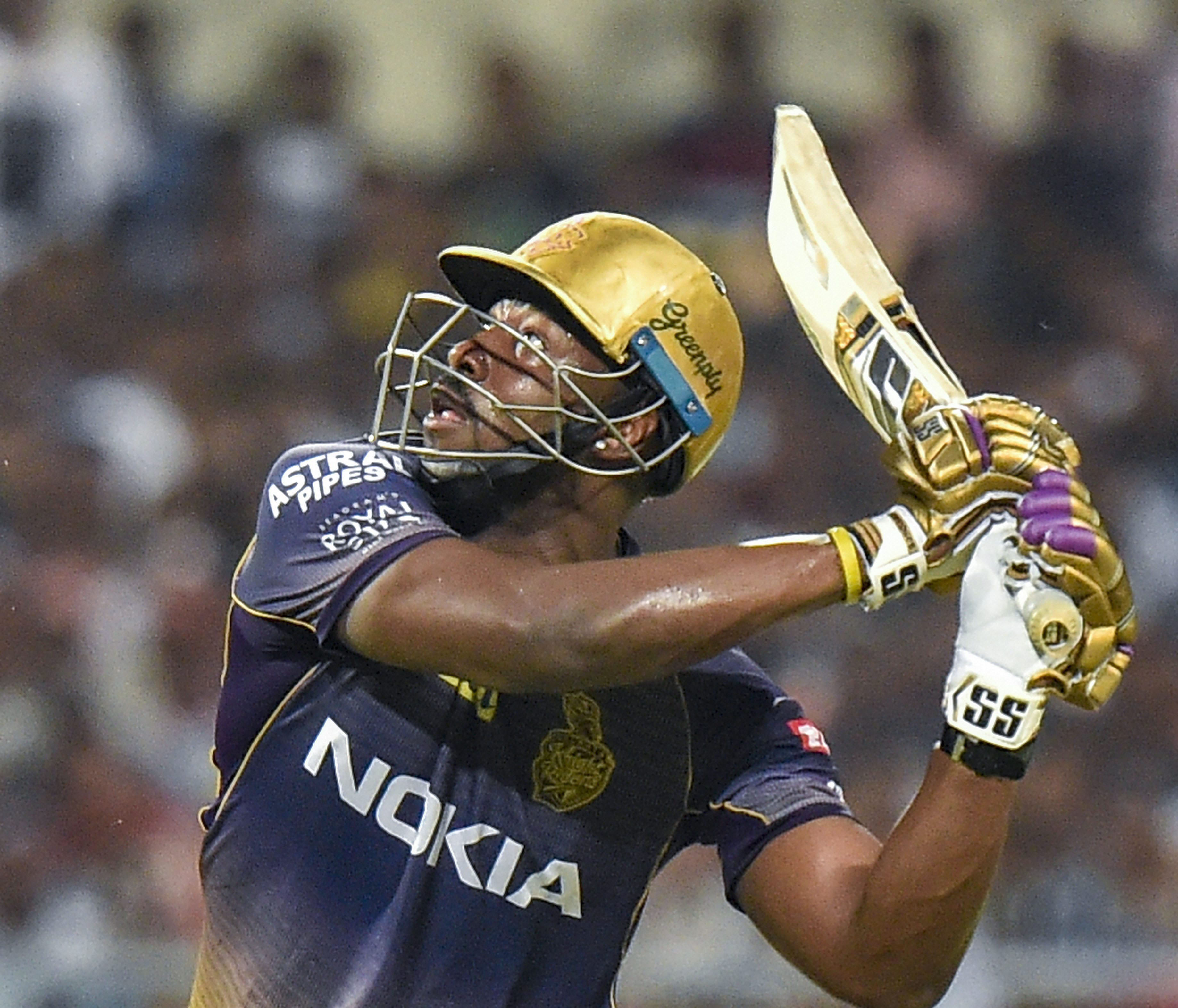 KKR batsman Andre Russell plays a shot during the Indian Premier League 2019 match between Delhi Capitals and Kolkata Knight Riders at Eden Garden in Calcutta on Friday. April 12,2019.