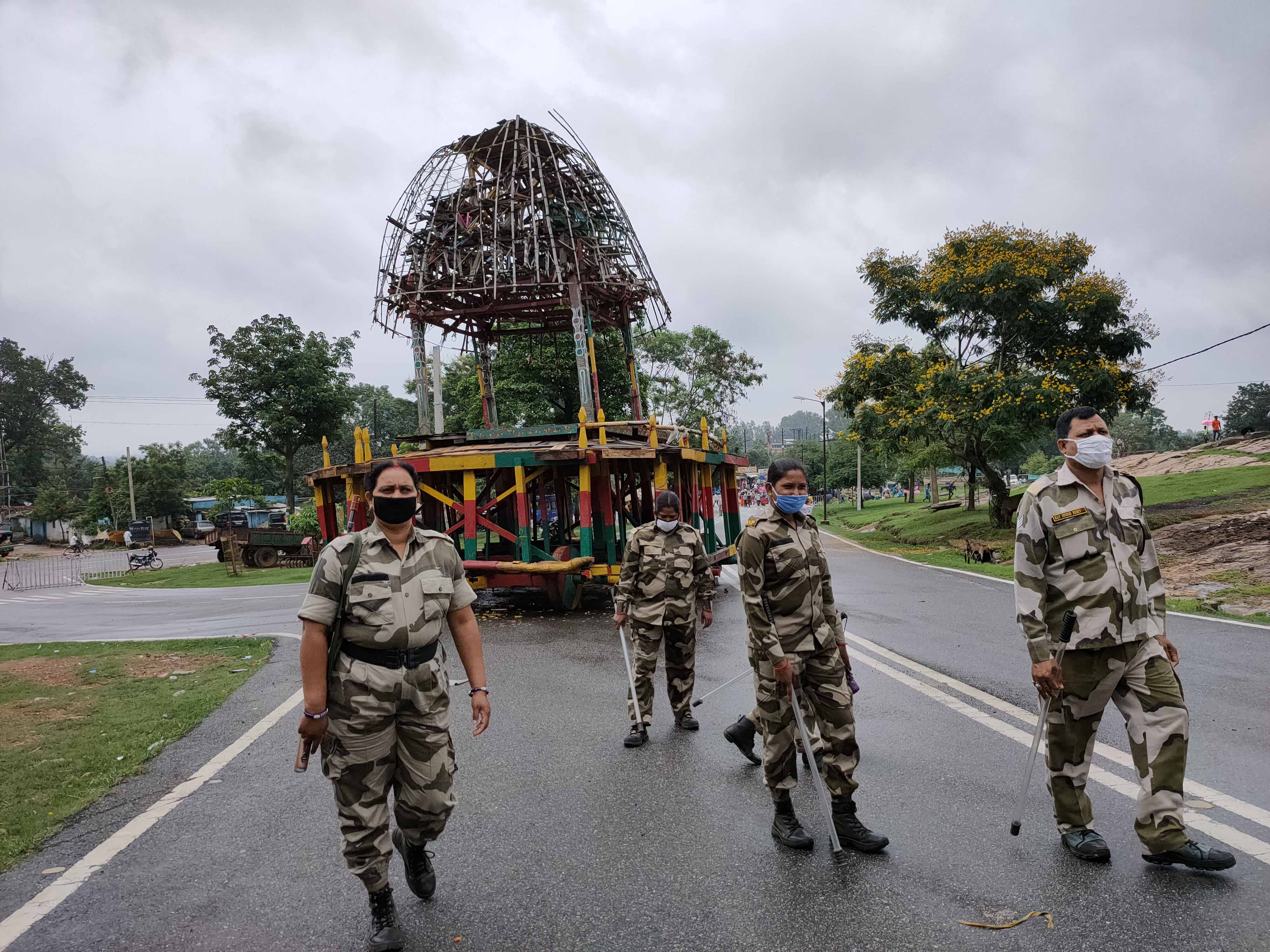 The unused chariot parked on the side of the road