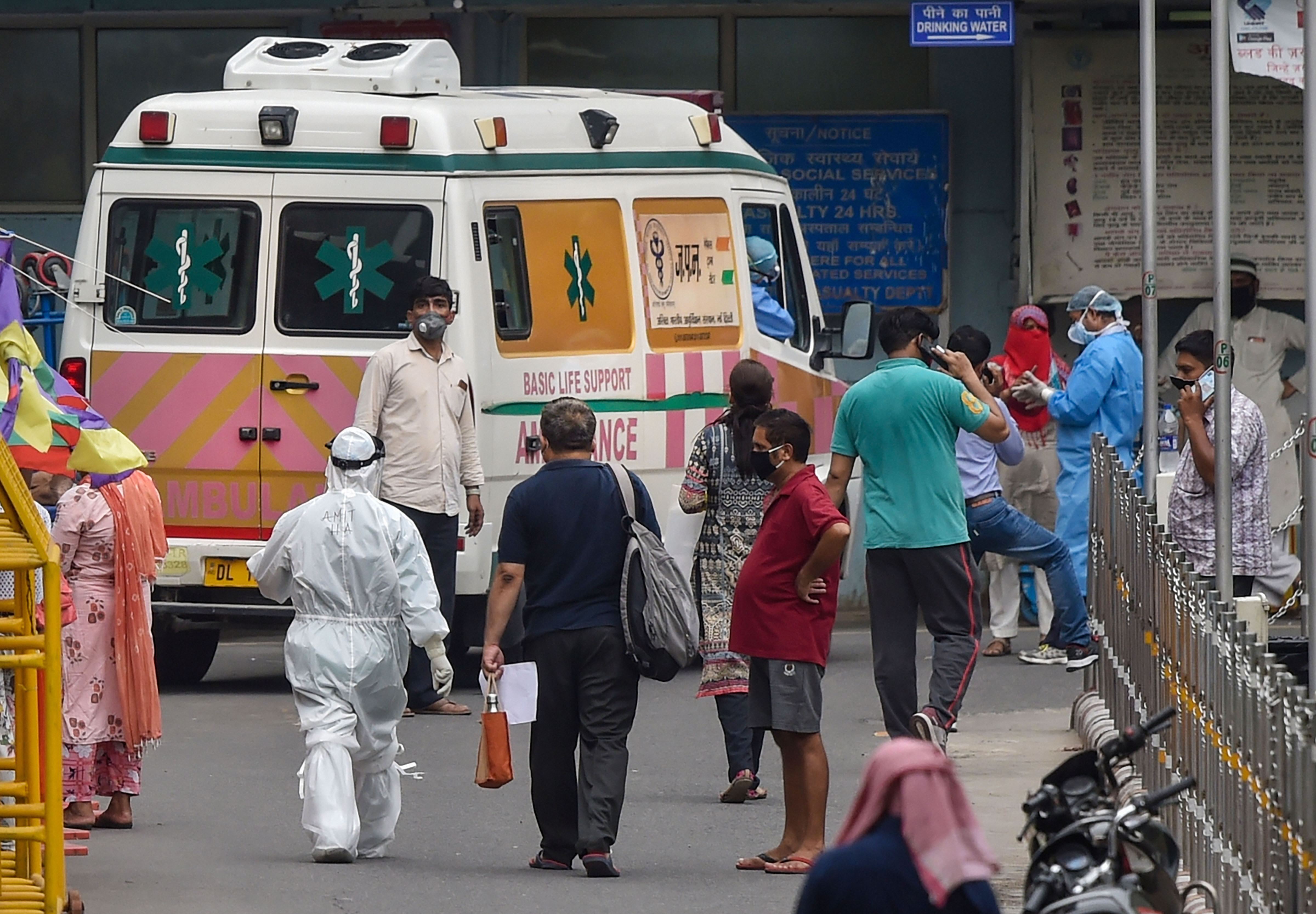 Medics wearing PPE kits with COVID-19 suspected patients at AIIMS, during the ongoing nationwide lockdown, in New Delhi, Thursday, June 4, 2020.