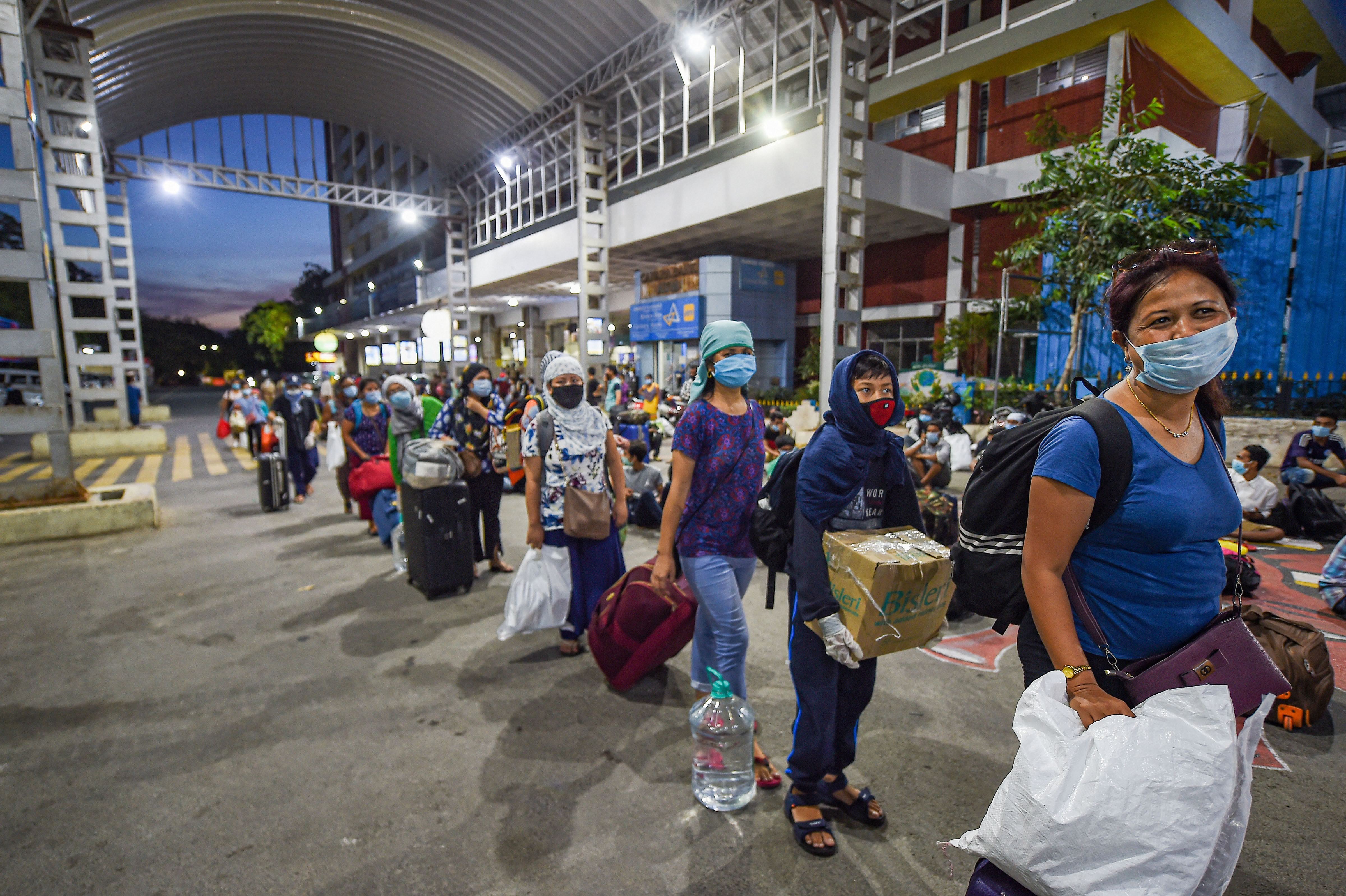 Migrants waiting in a queue to board trains to Assam and Meghalaya from Central Railway Station during the ongoing nationwide COVID-19 lockdown, in Chennai on Wednesday, May 13, 2020. 